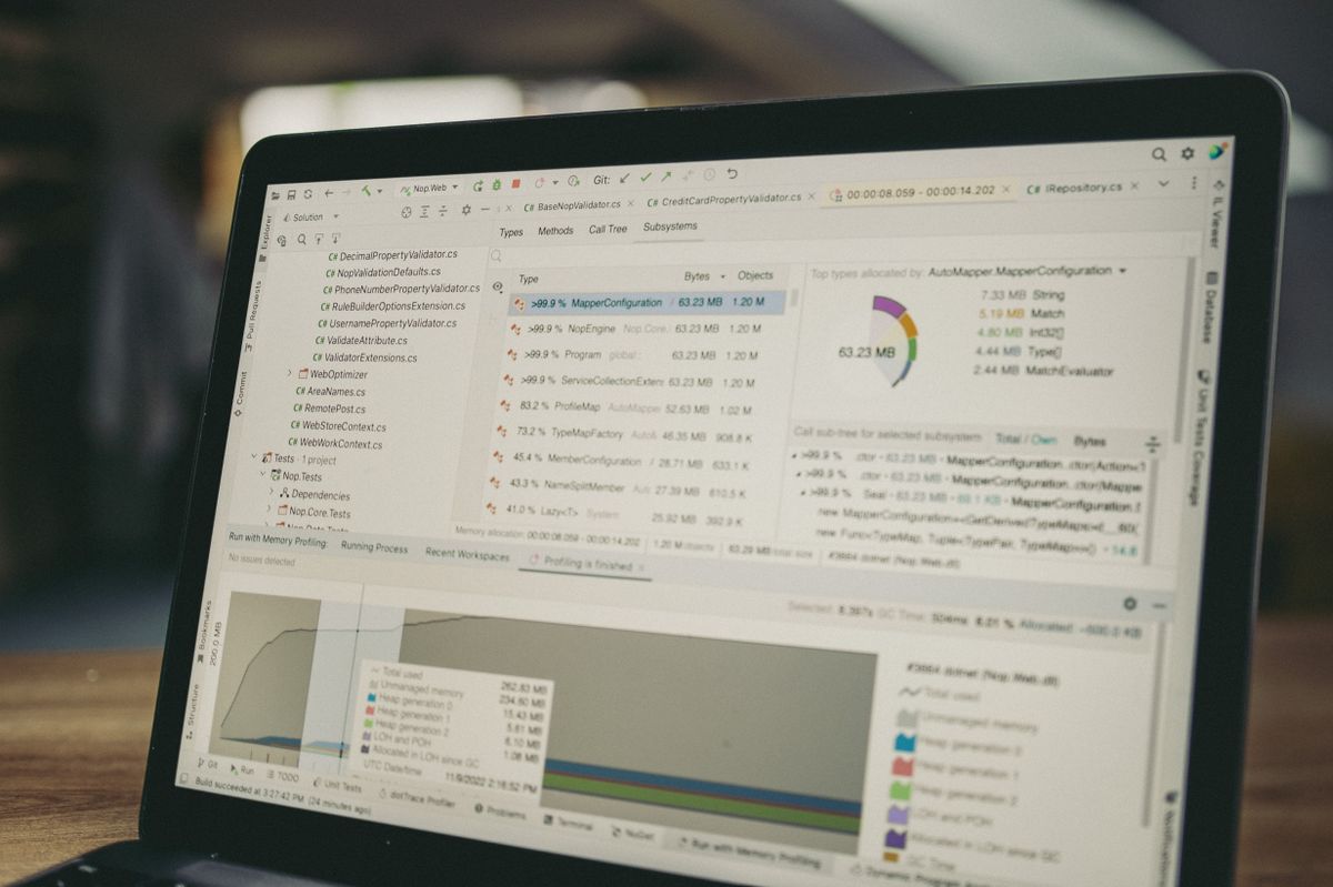A laptop screen showing code and a data analysis interface, illustrating how SQL joins combine tables for analysis