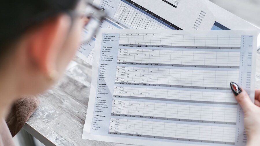 Excel sheet with a Company column containing names and bracketed IDs, and two adjacent columns showing the extracted numeric ID and the cleaned company name